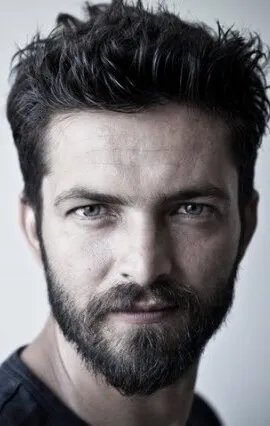 Фотография актёра Илькер Кызмаз