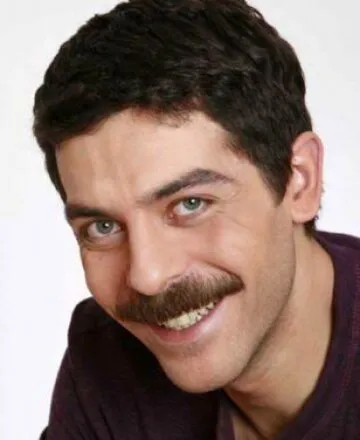 Фотография актёра Синан Тузджу