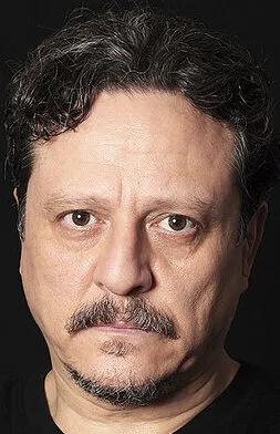 Фотография актёра Окдай Корунан