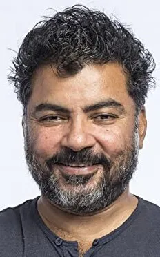 Фотография актёра Дэн Хусейн